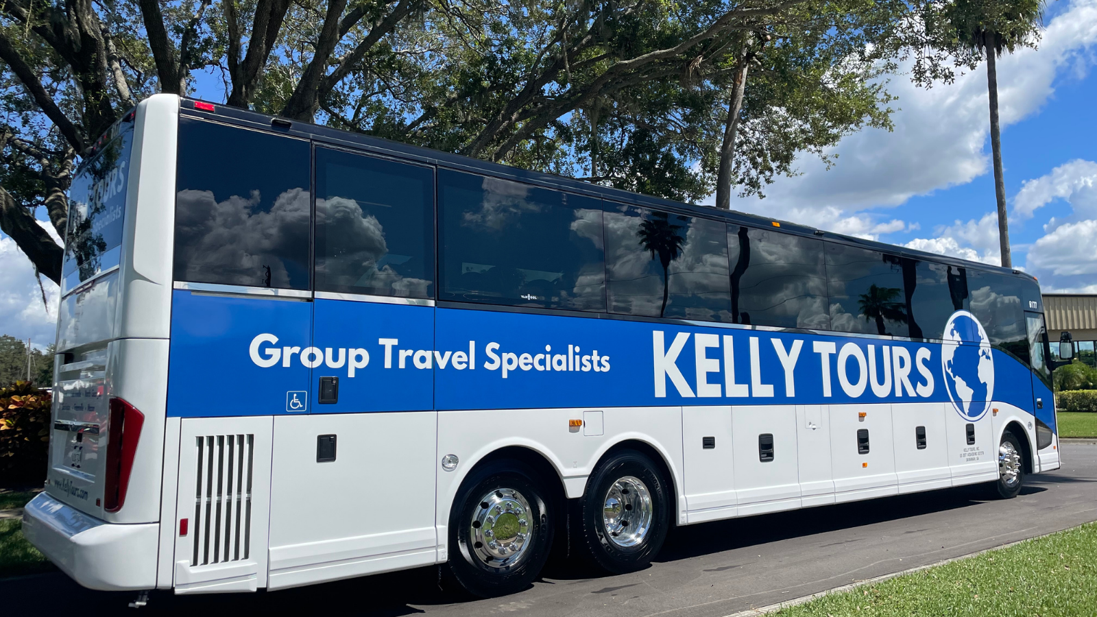 a charter bus parked near trees
